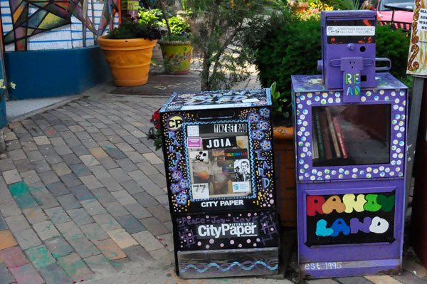 brightly painted Newspaper boxes